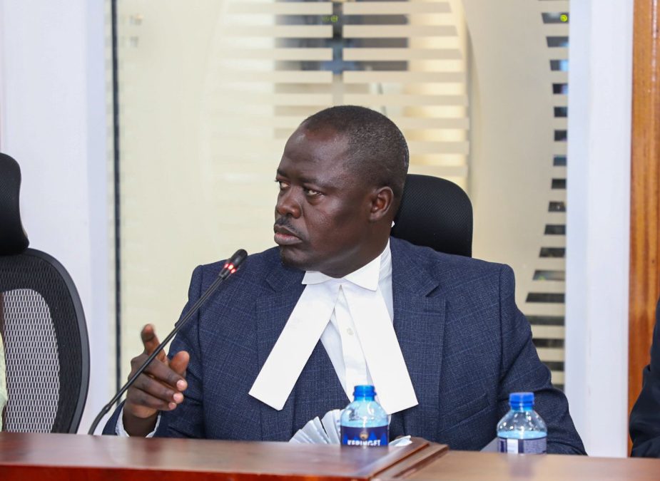 Peter Kaluma in Advocates collar.