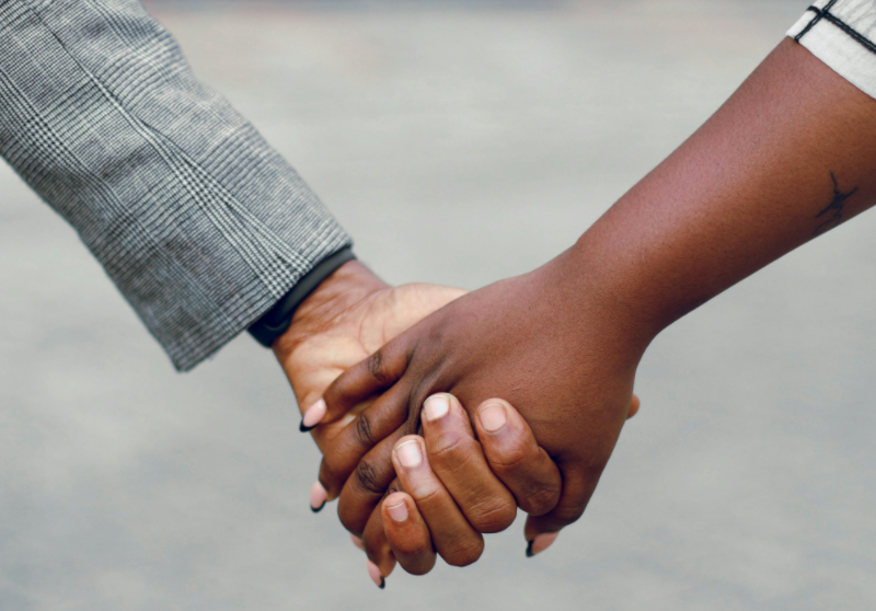 People holding hands. Image used for illustration purposes. PHOTO/Pexels