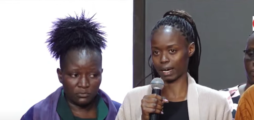 Nevninah speakING while a family member stands beside her in comfort. PHOTO/Screengrab by K24 Digital of YouTube video by Azimio TV.