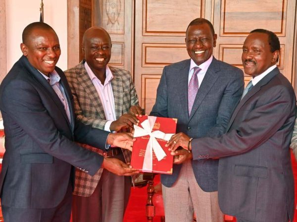 NADCO co-chairs Kimani Ichungwa and Kalonzo Musyoka present the report to President William Ruto and his former Deputy Rigathi Gachagua in 2024. PHOTO/@KIMANIICHUNGWAH/X