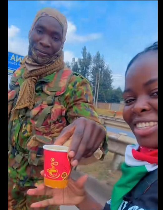 Kawira when she was handed a cup of coffee by a cop on Monday, July 7, 2025. PHOTO/Screengrab by K24 Digital of TikTok video by @kawirabackup