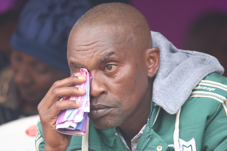 Boniface’s father, Jonah Kariuki, sheds tears during his son’s burial on July 11, 2025. PHOTO/https://www.facebook.com/kalonzomusyoka
