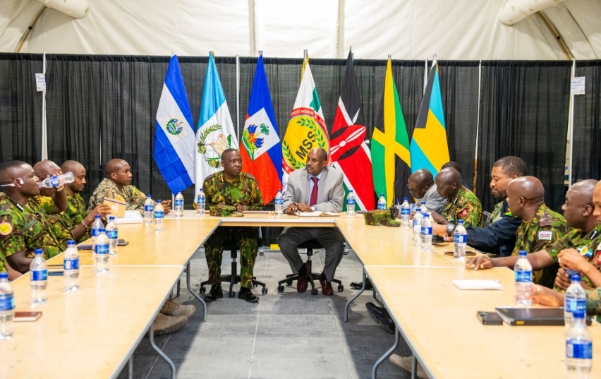 MSS commander Godfrey Otunge and Kenya's consul-general to Haiti Noor Gabow engage with security officers in Haiti on July 22, 2025. PHOTO/@MSSMHaiti/X