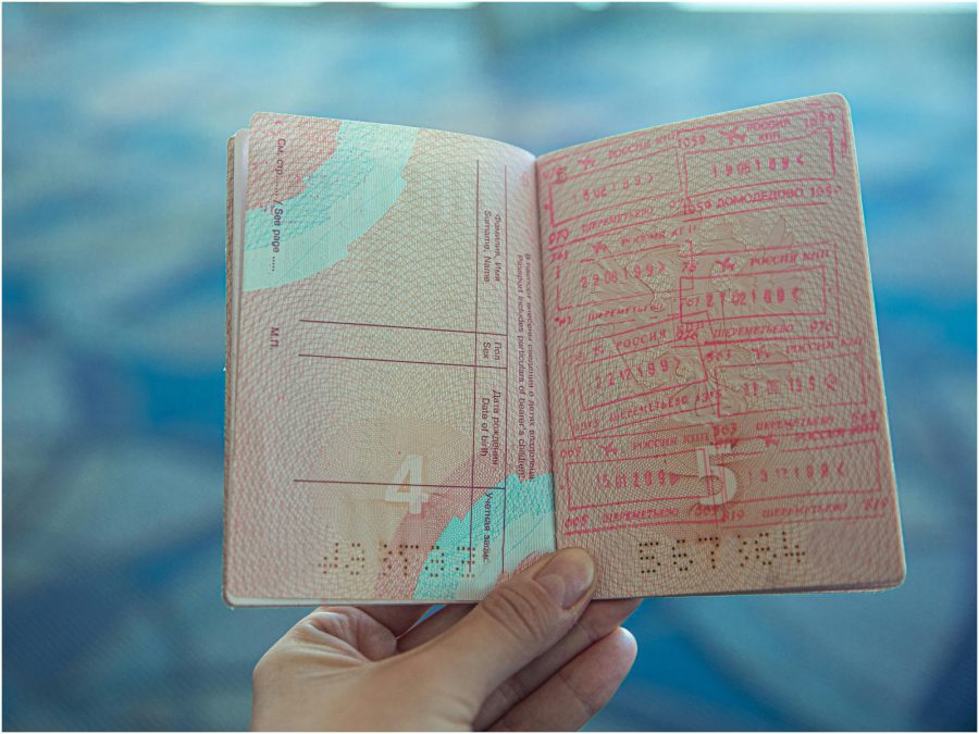 Person holding an opened passport; image used for representation purposes. PHOTO/Pexels