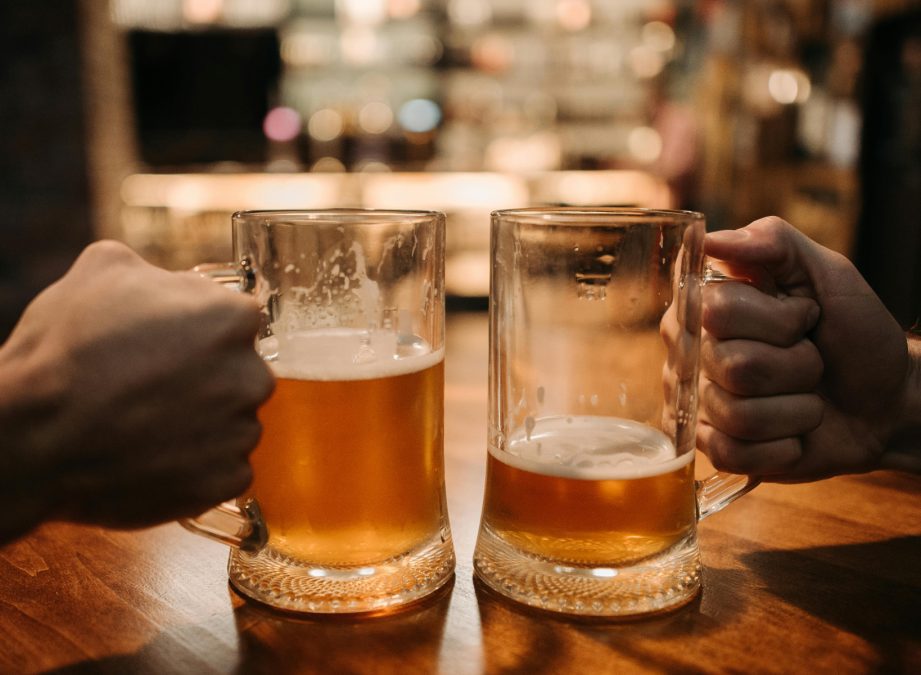 People holding glasses of beer, image used for representation purposes. PHOTO/Pexels