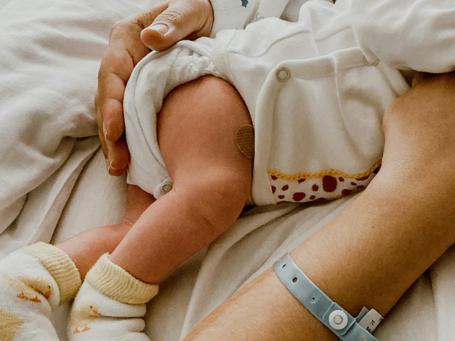 Woman holding newborn
