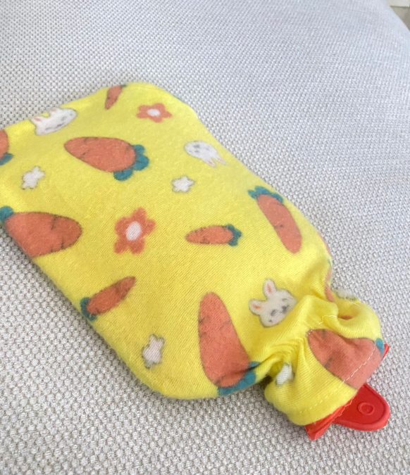 A hot water bottle wrapped in a yellow cloth. PHOTO/Ascah Mwango
