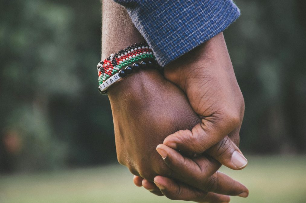 Photo of couple holding hands. PHOTO/Pexels