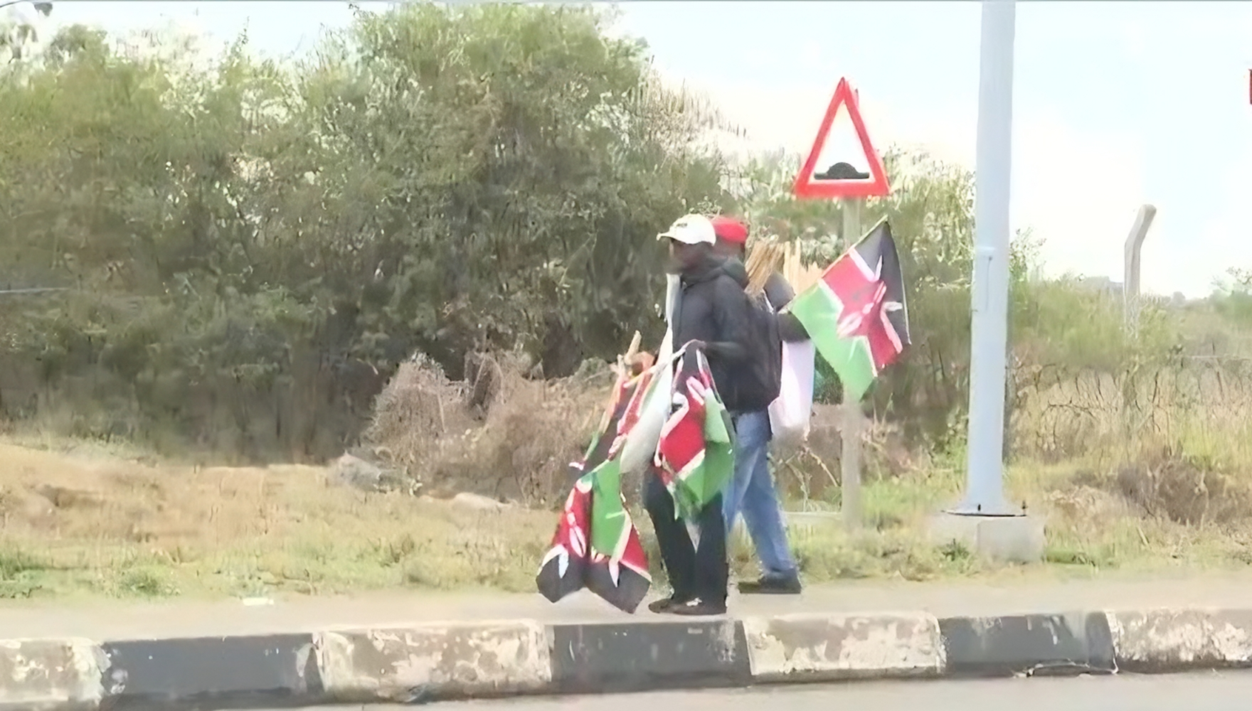 Youths carrying Kenyan flags filmed en route to JKIA