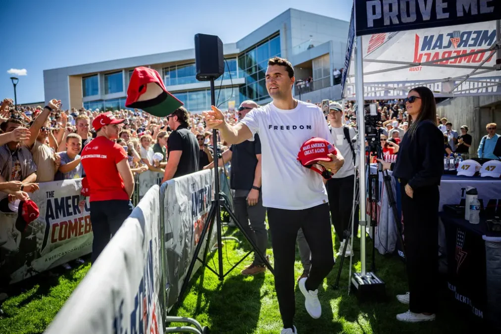 Charlie Kirk hands out hats before he was shot during Turning Point USA’s visit to Utah Valley University in Orem on Wednesday, September 10, 2025. PHOTO/https://www.deseret.com/utah/2025/09/10/charlie-kirk-shot/