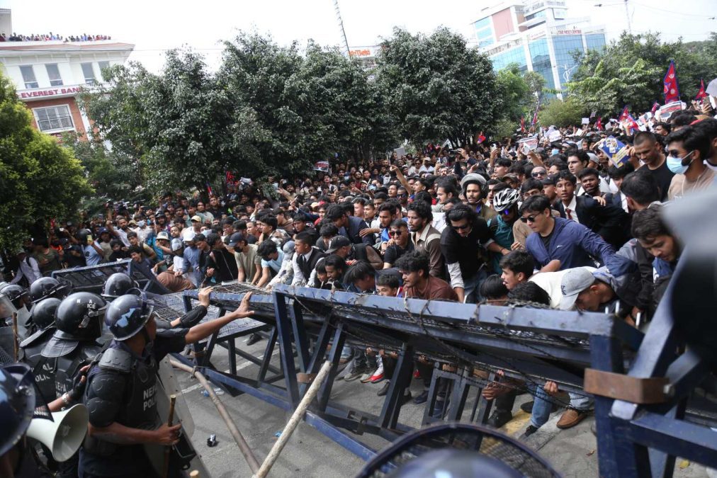 Police clash with demonstrators during a protest in Nepal’s capital.