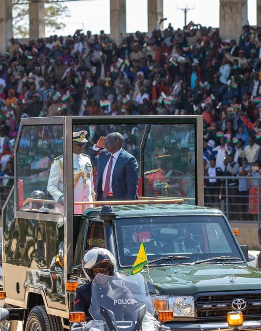 President William Ruto salutes at attendees of Mashujaa Day fete in Kitui. PHOTO/https://www.facebook.com/KithureKindiki