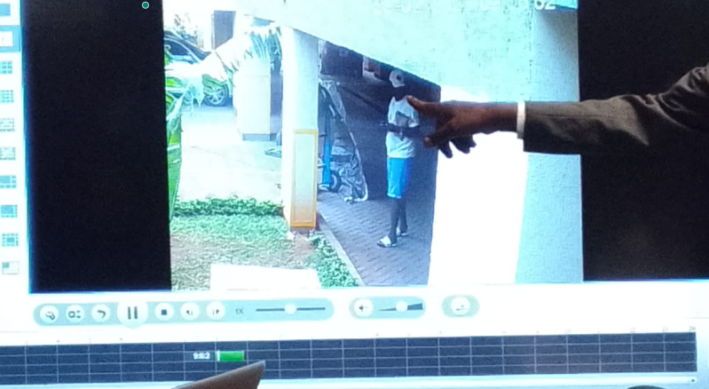 A still photo of the Mugithi Artist DJ Fatxo captured from CCTV footage as he was near the area the deceased body was lying as played in court on Thursday, October 23, 2025, before Milimani Principal Magistrate Rose Ndombi. PHOTO/Zipporah Ngwatu