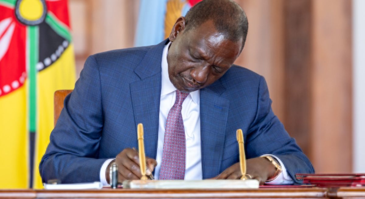 President William Ruto signs a bill at State House. PHOTO/@WilliamsRuto/X.