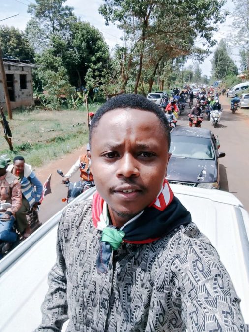 Activist Billy Mwangi takes a selfie along a convoy of cars headed to Mama Gift in Embu. PHOTO@MwangiHub/X