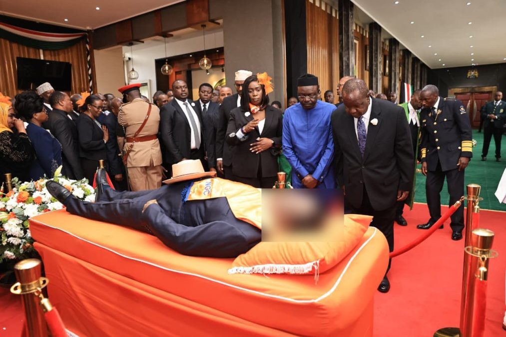 Former Interior CS Fred Matiang’i bows his head in respect before the body of the late Raila Odinga at the Parliament Buildings on October 17, 2025. PHOTO: @Babunjoriahke/X
