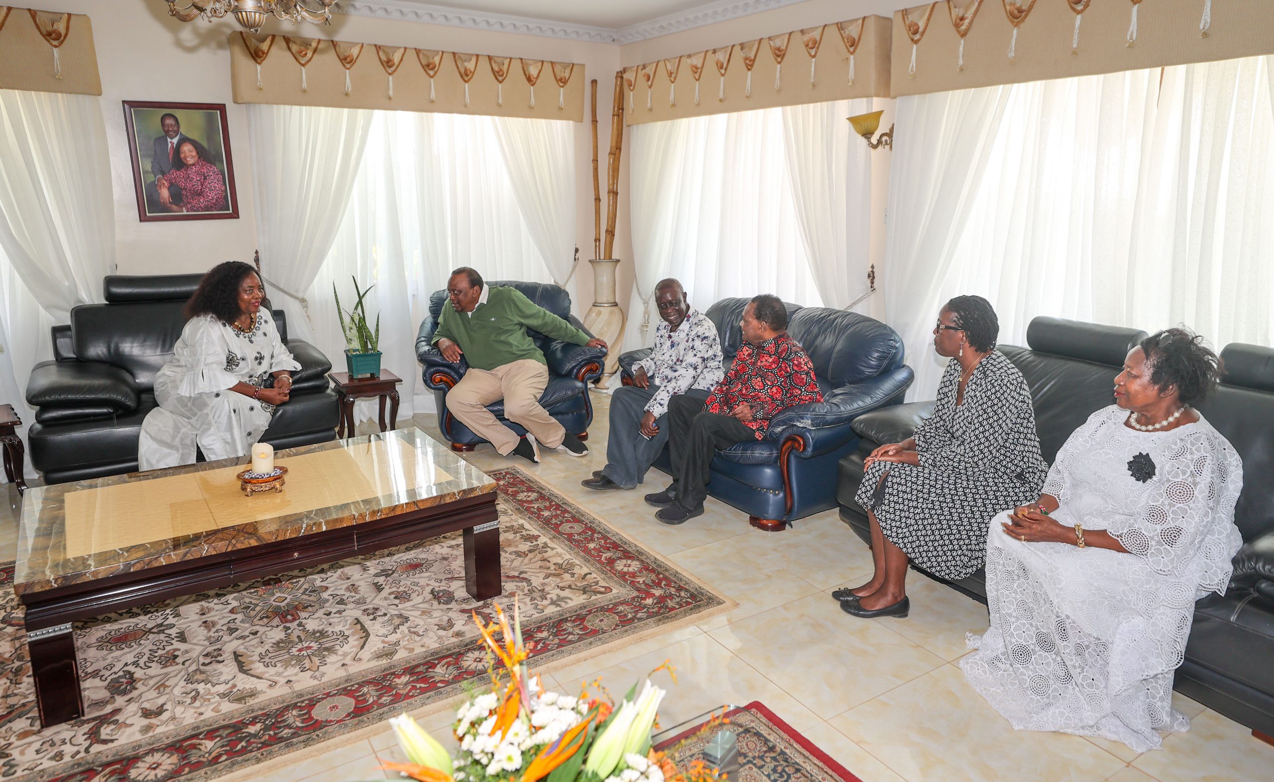 Former President Uhuru Kenyatta with the family of the late Raila Odinga in Bondo on Monday October 20, 2025. PHOTO/@4thPresidentKE/X