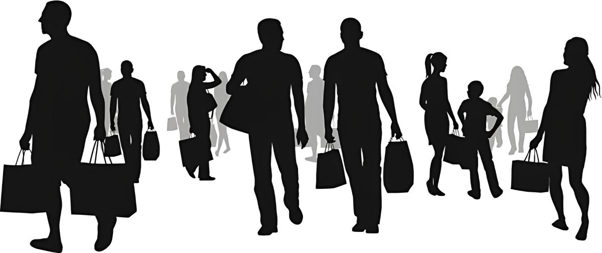 A silhouette of customers carrying shopping bags. PHOTO/Pexels
