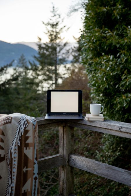 A photo of laptop placed on a stand. Photo/Pexels