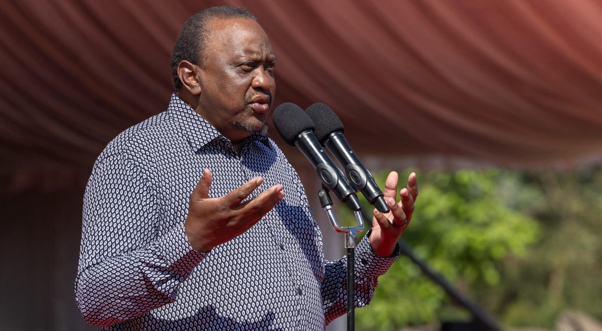 Former President Uhuru Kenyatta gestures during the burial of the late Raila Odinga. PHOTO/https://www.facebook.com/KithureKindiki/