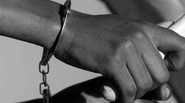 An image of a person in handcuffs. PHOTO/@DCI_Kenya/X