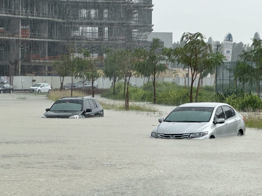 Vehicles stuck in rising floodwaters after heavy rains. Image used for illustration. PHOTO/@AbiluTangwa/X