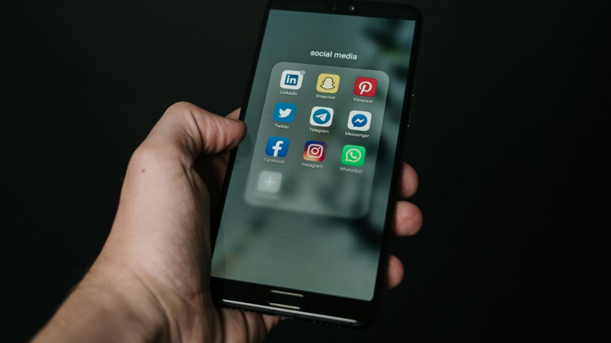 A hand holding a smartphone. Image used for illustrative purposes only. PHOTO/Pexels