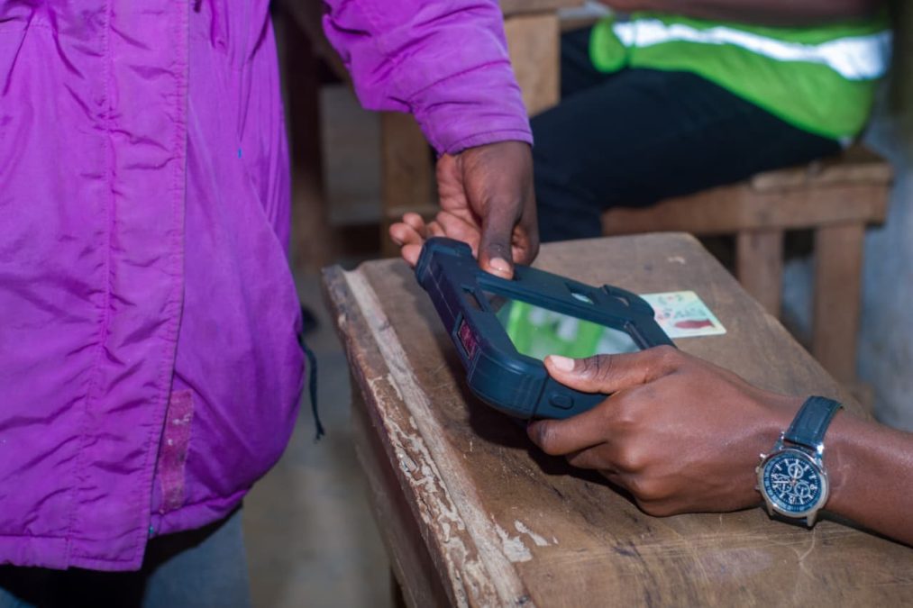 Someone being identified before voting. PHOTO/@IEBCKenya/X
