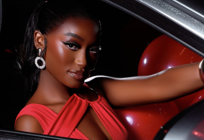Digital creator and influencer Kendi Q inside her Mercedes-Benz E250. PHOTO/@officialkendichristine/ Instagram
