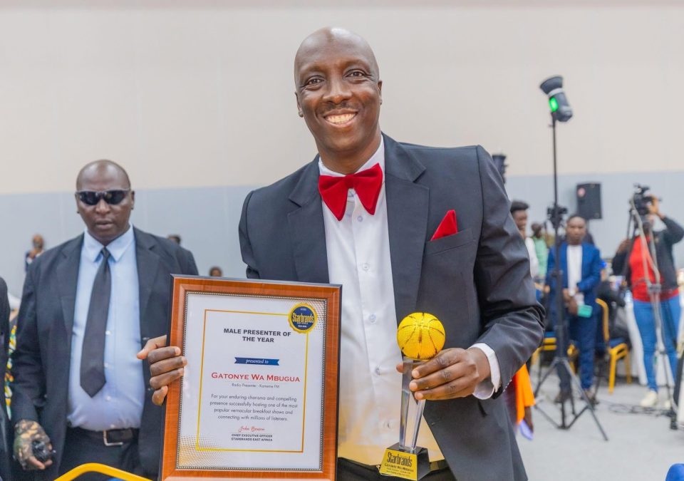 Gatonye Mbugua poses with his Starbrands award. PHOTO/https://www.facebook.com/Kameme101