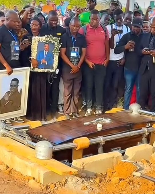 Mourners watch as MC Pilipili's casket is lowered inside a grave. PHOTO/@kingfreiz/Instagram