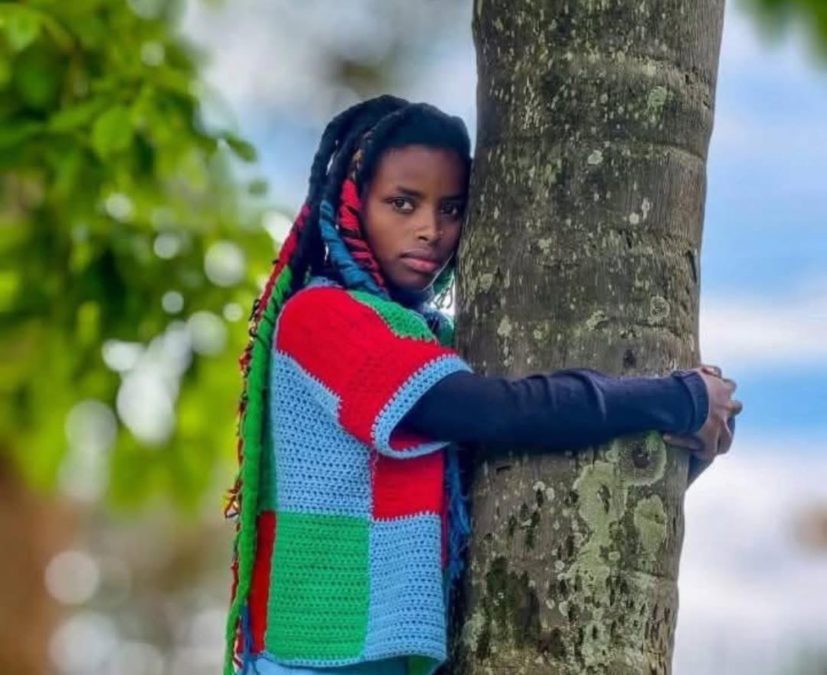 Truphena Muthoni hugging a tree.PHOTO/truphena_muthoni/Instagram