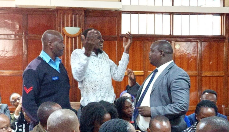 Activist Mulinge Muteti (Centre) when he was protesting before Justice Chacha Mwita at the Milimani High Court on Tuesday, July 1, 2025.PHOTO/Zipporah Ngwatu