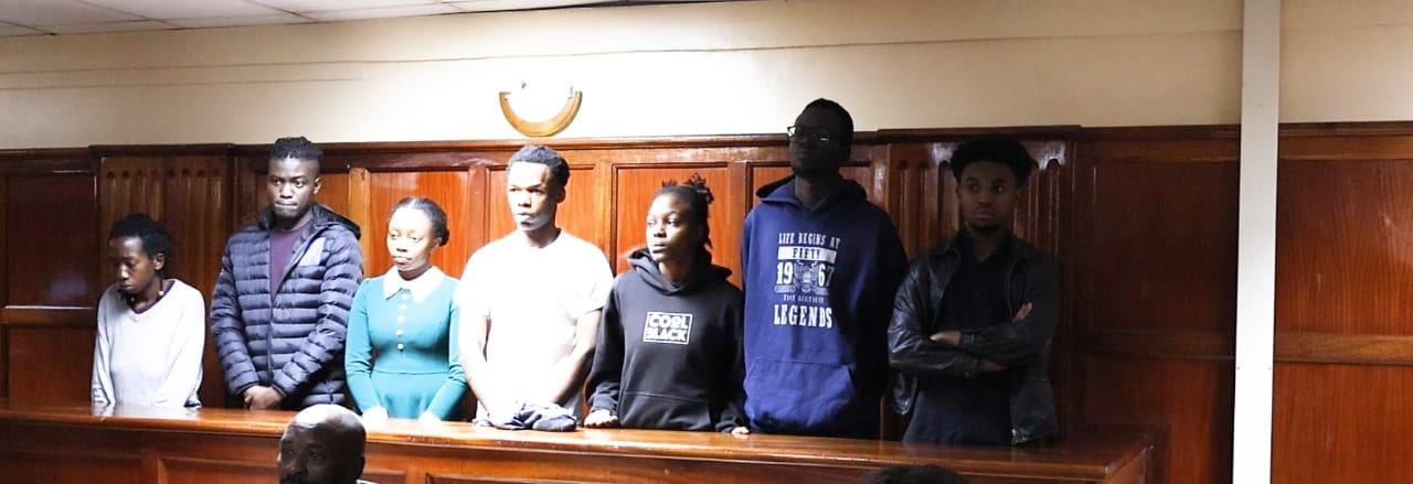 Parents break down after being allowed to speak to university students arrested over death case