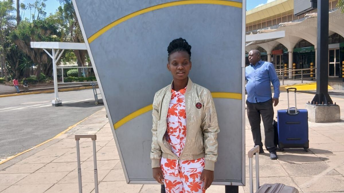 Mama Gift poses at JKIA on Monday, December 15, 2025. PHOTO/https://www.facebook.com/kirubi.samuel.7