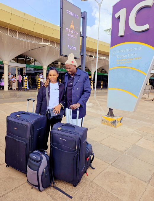 Njeru Thiga poses with his wife at JKIA. PHOTO/https://www.facebook.com/KaranguMurayaMc