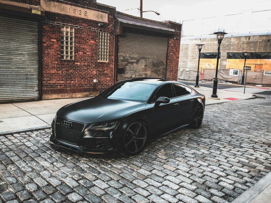 A car parked outside a home. PHOTO/Pexels