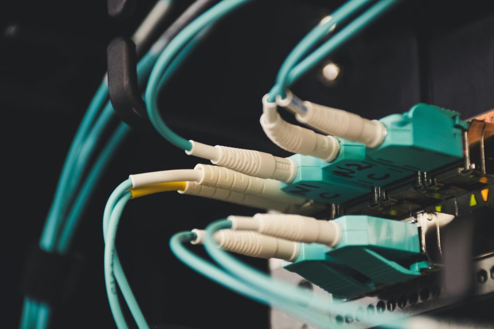 Several cables plugged inside a router. PHOTO/Pexels