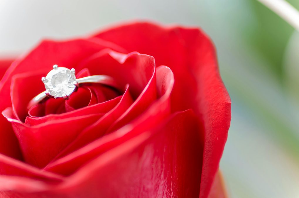 A well-designed image of a ring put inside a flower. PHOTO/Pexels