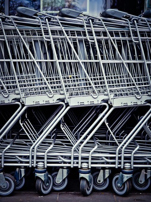 A pile of shopping trolleys parked outside a shopping building. PHOTO/Pexels