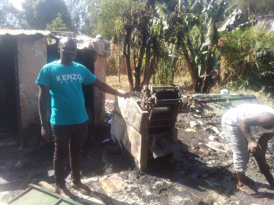 onnie Egesa points at the remains of his items after fierce fire razed his ICT shop at Luanda market Vihiga county on Sunday night on 18th January 2026.Photo/Enock Amukhale
