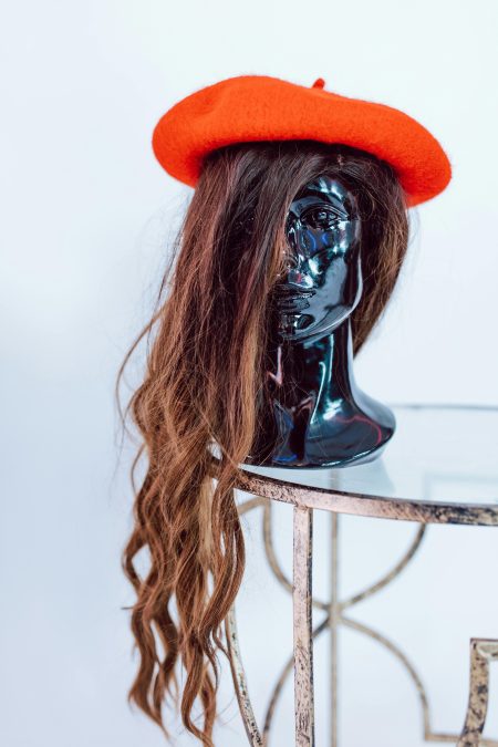 Black mannequin wearing a brown wig. Image used for illustration purposes. PHOTO/Pexels