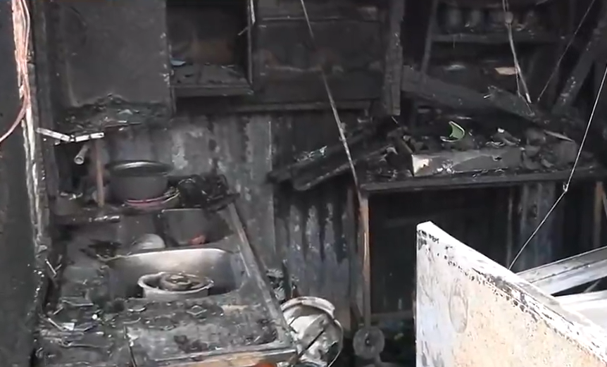 The aftermath of the New Year fire in Gitaru, Kiambu, which destroyed a family home. PHOTO/Screengrab by K24 Digital from a video by Nation Africa