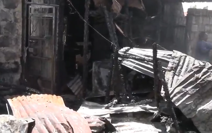 The aftermath of the New Year fire in Gitaru, Kiambu, which destroyed a family home. PHOTO/Screengrab by K24 Digital from a video by Nation Africa