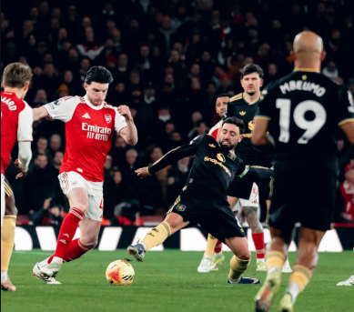 Bruno Fernandes battles Declan Rice for the ball during the clash. PHOTO/@ManUtd/X