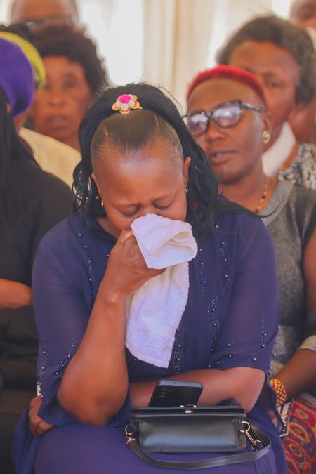 George Gathu's widow during his burial at Kamunyaka grounds in Mathira Constituency. PHOTO/Loise Wambugu