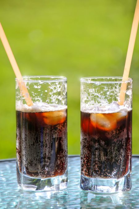 An image of a soda drink inside two glasses. PHOTO/Pexels