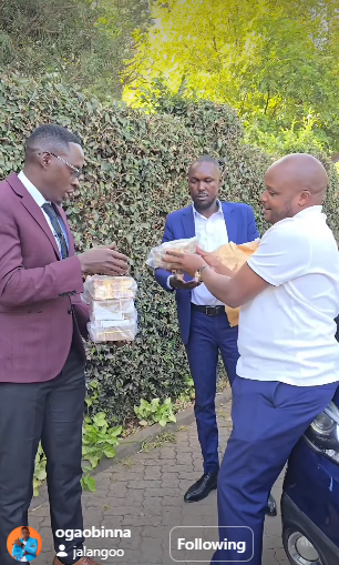 Oga Obinna receiving the Ksh4 million from Langata MP Jalang’o on February 9, 2026. PHOTO/ A screengrab by K24 Digital of posts by ogaobinna/Instagram