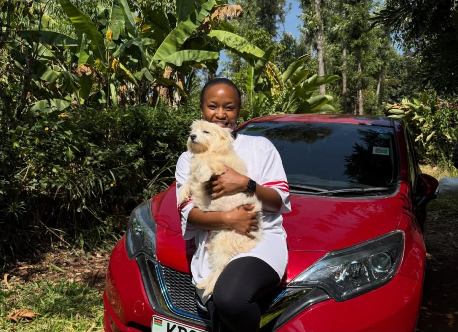 Digital content creator Kris Baby standing in front of her car. PHOTO/@krisbabyy/Instagram