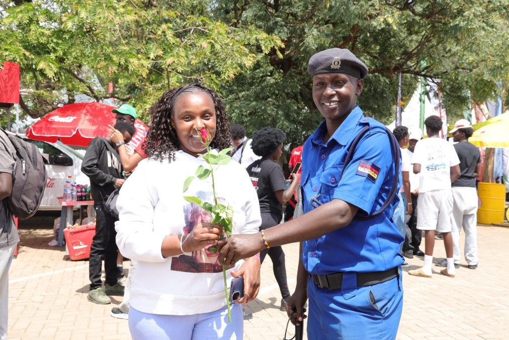 A Kenyan receives a flower from a police officer during Valentine’s Day celebrations. PHOTO/@PoliceKE/X